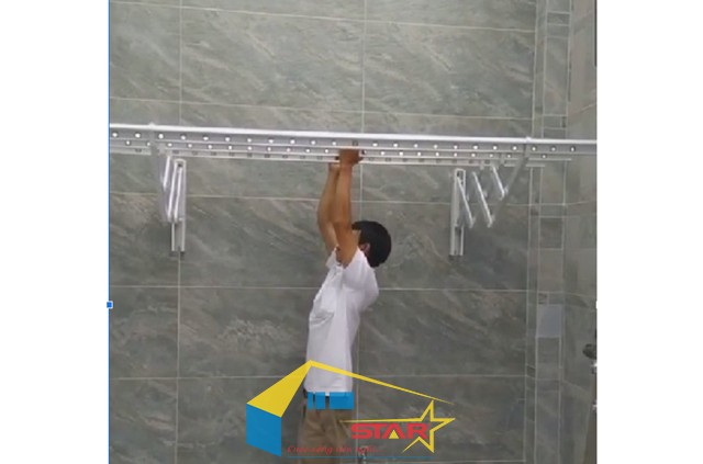 giàn phơi gắn tường, lắp đặt giàn phơi gắn tường, giàn phơi inox, giàn phơi thông minh, Tuấn Vinh Shop, giàn phơi ban công, lắp giàn phơi tại TP.HCM