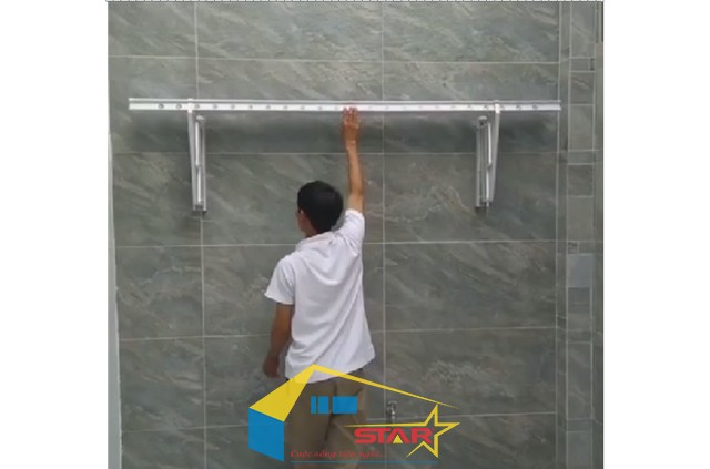 giàn phơi gắn tường, lắp đặt giàn phơi gắn tường, giàn phơi inox, giàn phơi thông minh, Tuấn Vinh Shop, giàn phơi ban công, lắp giàn phơi tại TP.HCM